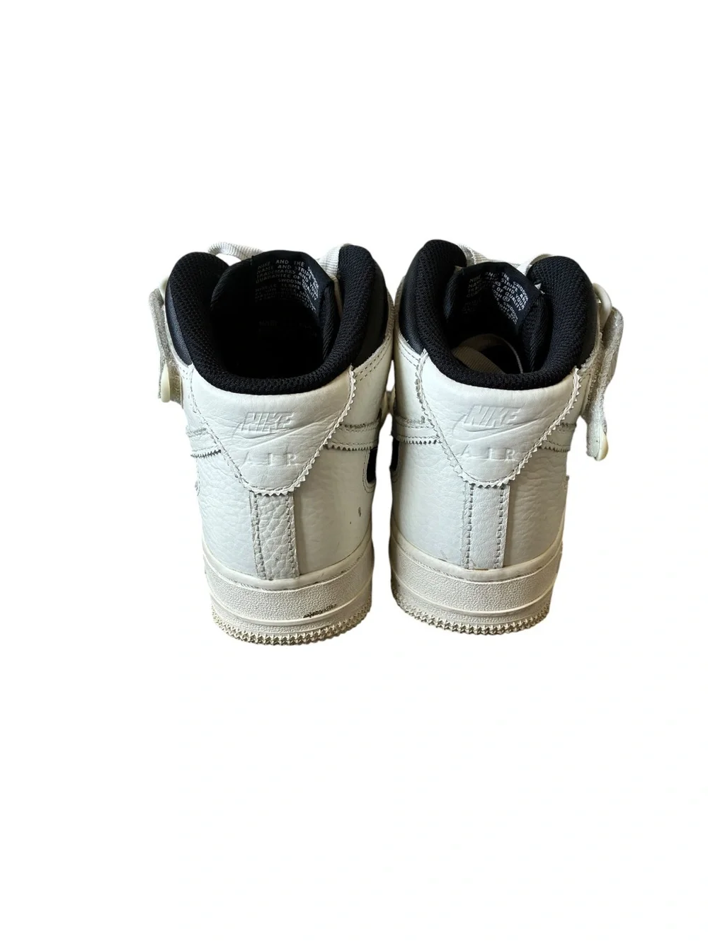 Nike Women’s White and Black High-Top Sneakers